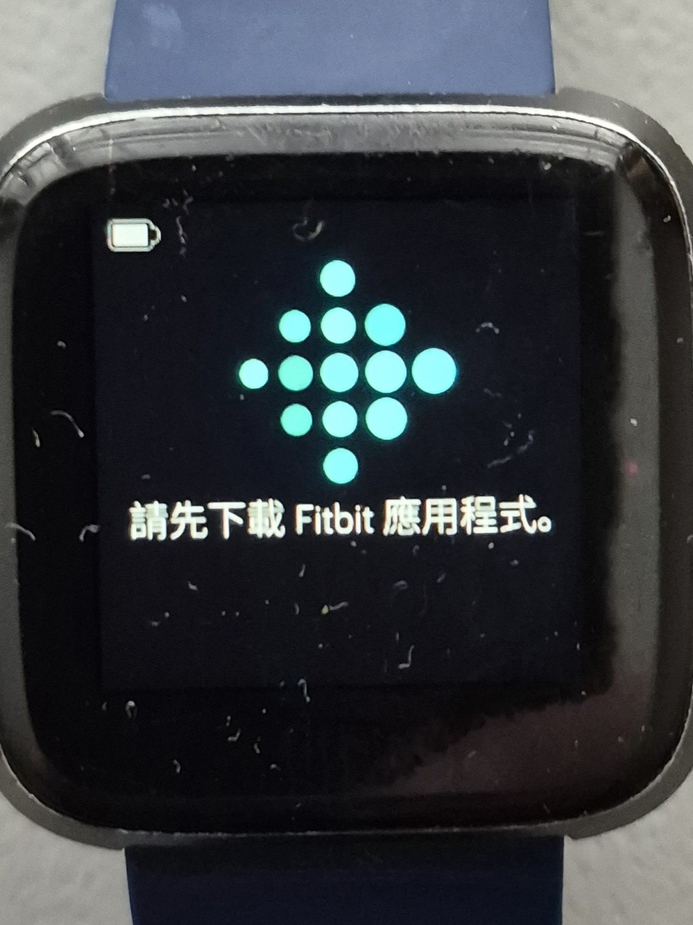 fitbit smartwatch with navy blue silicone band